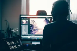 Digital professional editing visual content using AI tools showing the changing role of images in modern digital workflows